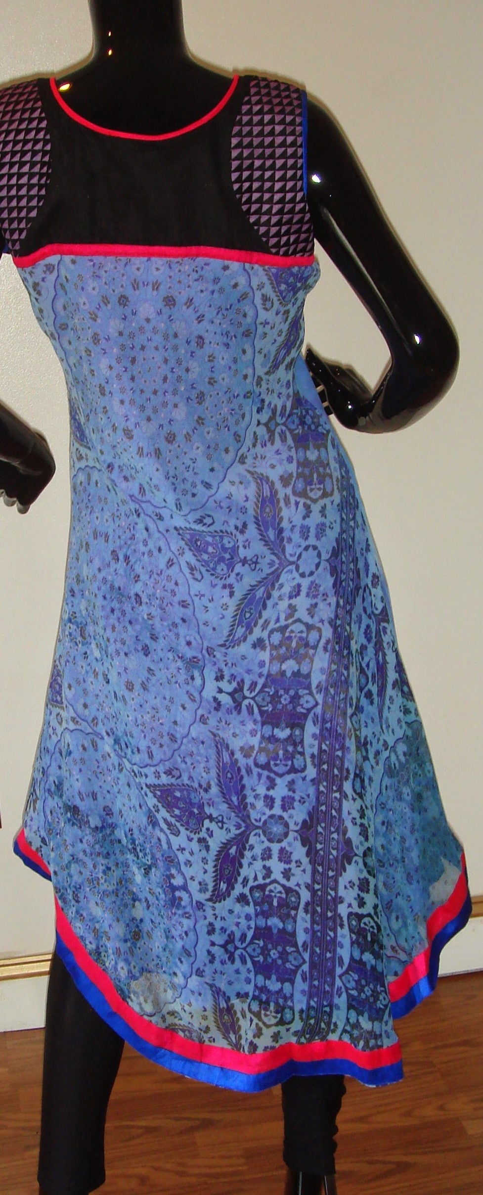 TNM'' Asymmetric Kurti