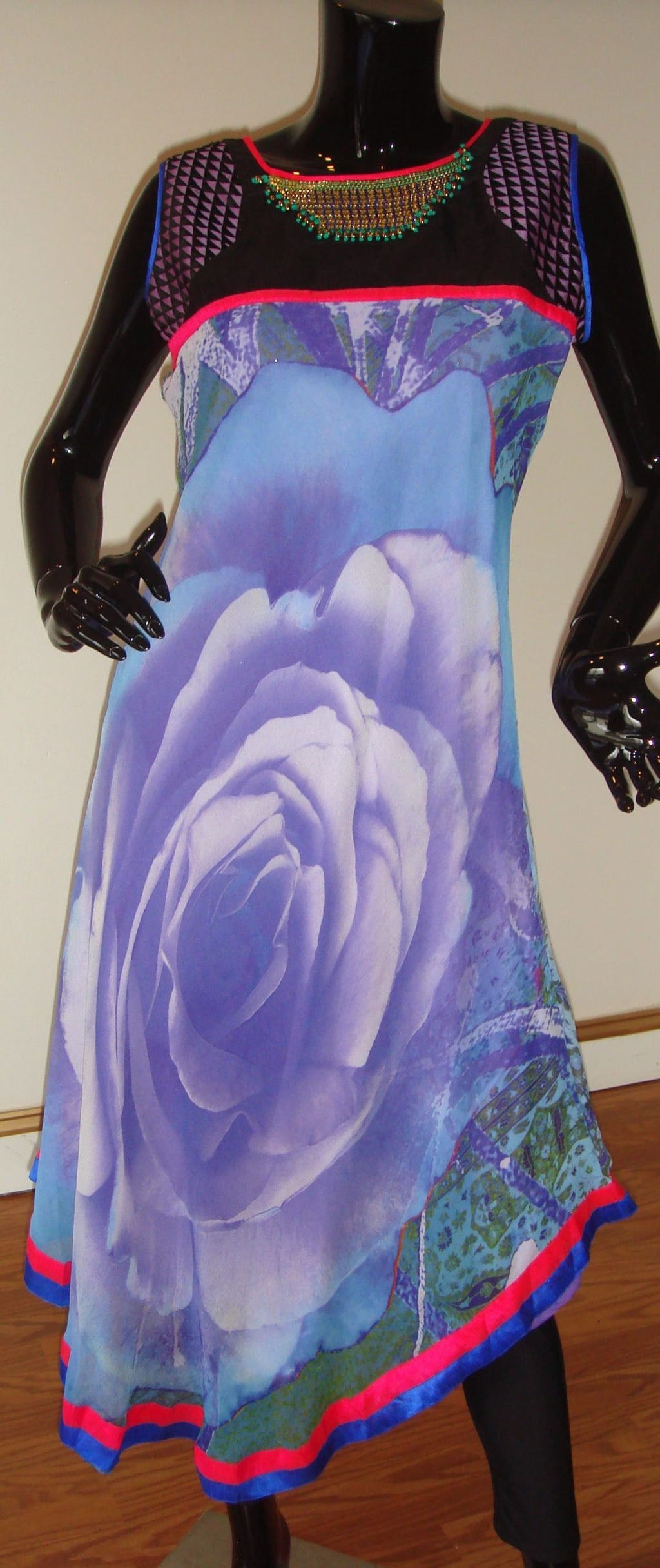 TNM'' Asymmetric Kurti