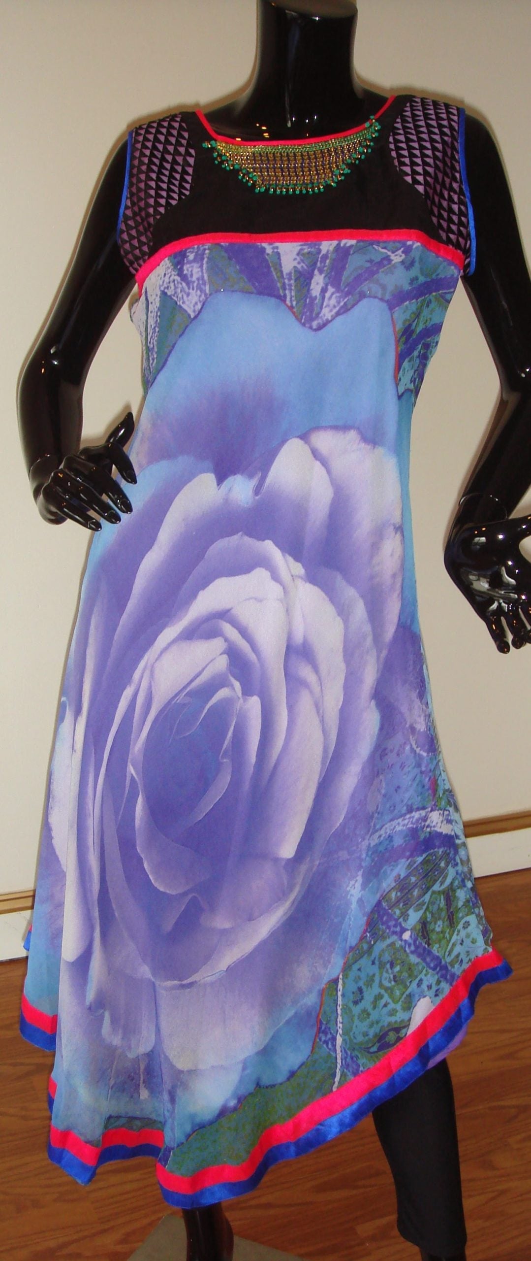 TNM'' Asymmetric Kurti