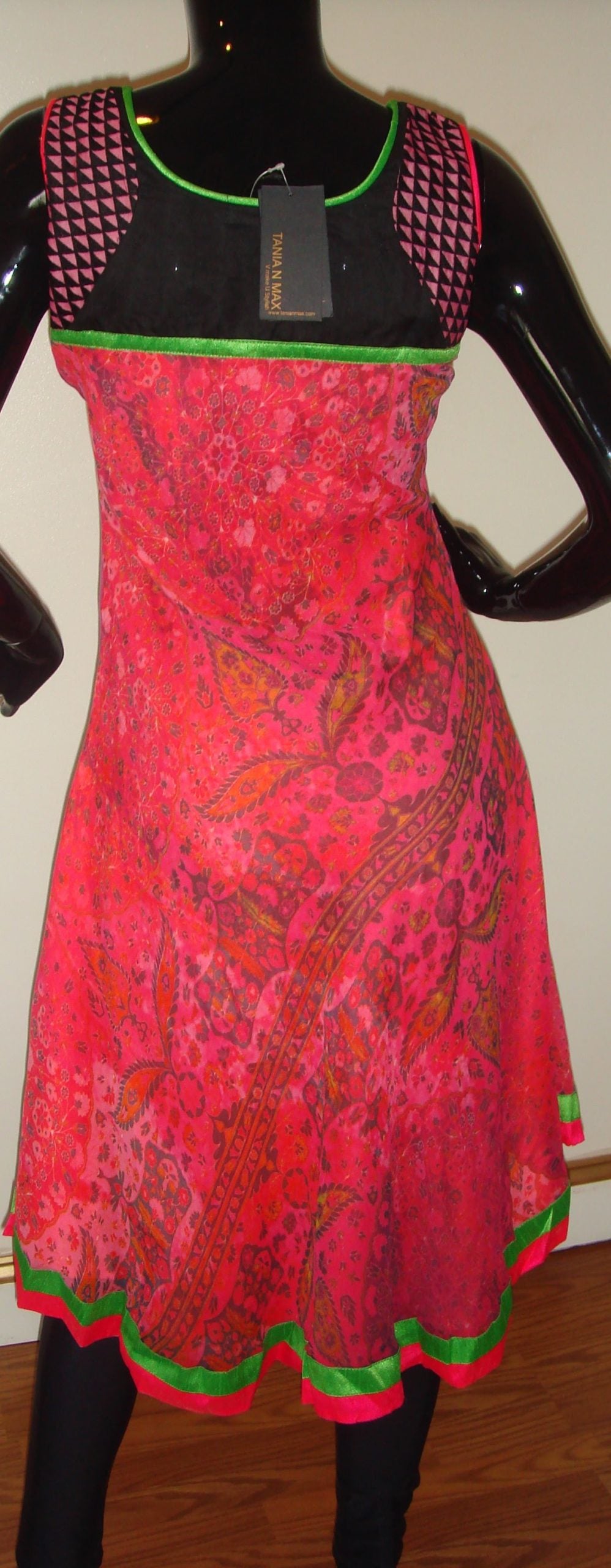TNM'' Asymmetric Kurti