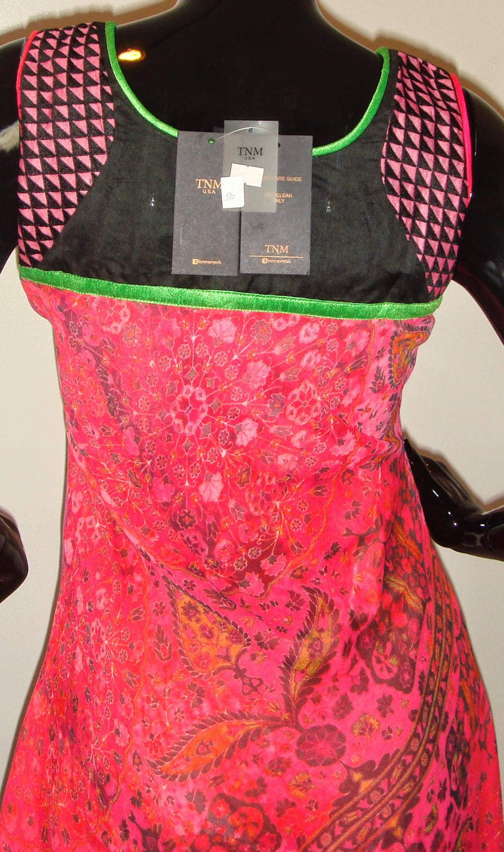 TNM'' Asymmetric Kurti