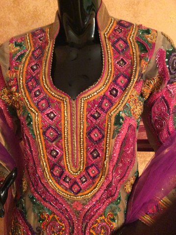 Embroidered Net Churidar Suit with Cut Dana Work